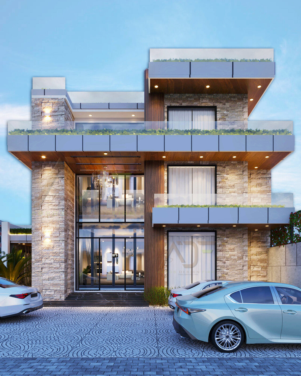 The villa's entrance elevation at dusk: stone cladding, timber
                  louvres and planted terraces stacked over a lit porch.
