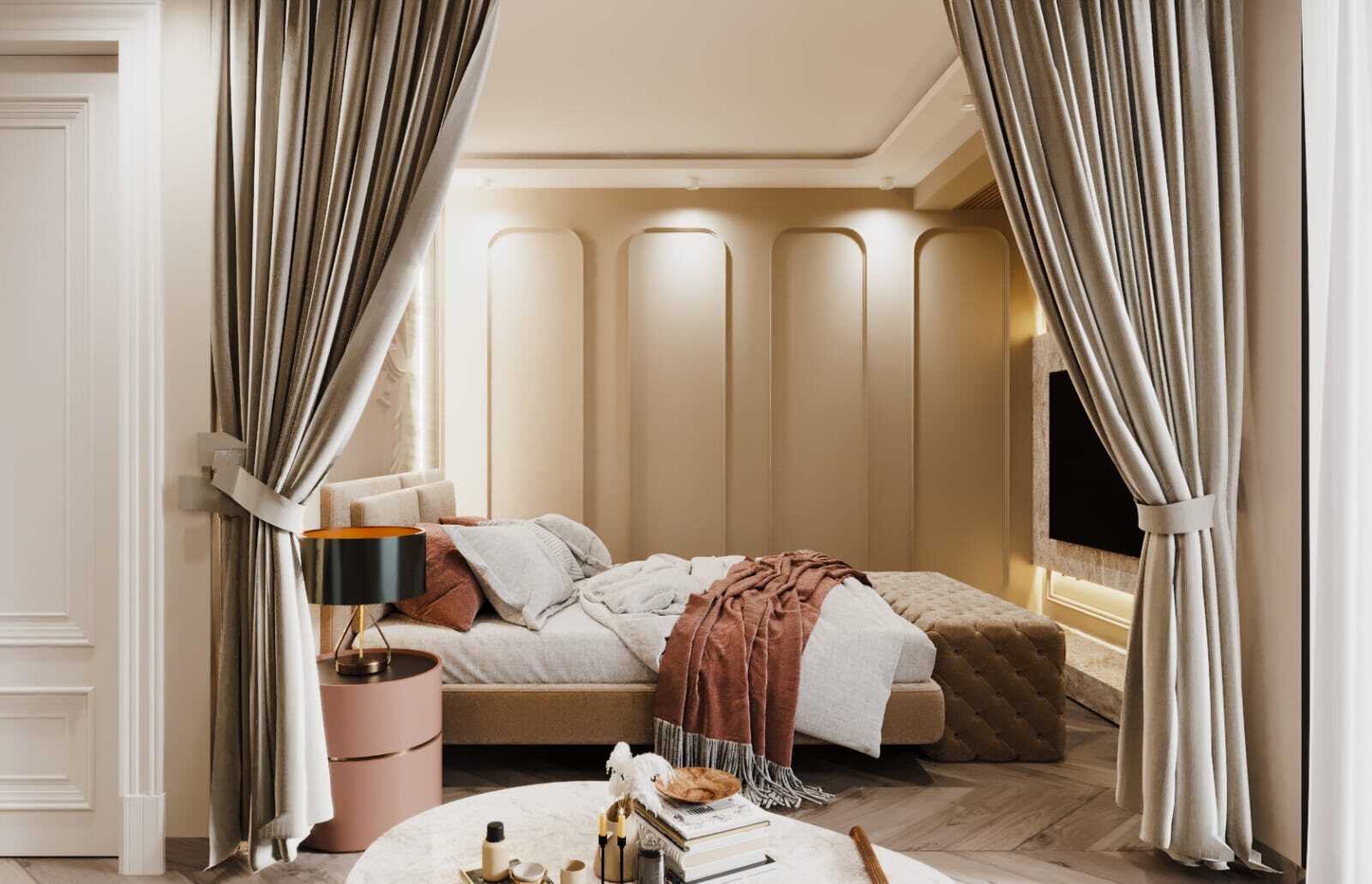 A second bedroom framed by full-height curtains: an arched fluted
                  recess behind the bed, a pink drum table at its foot and the
                  television set into the panelling opposite.