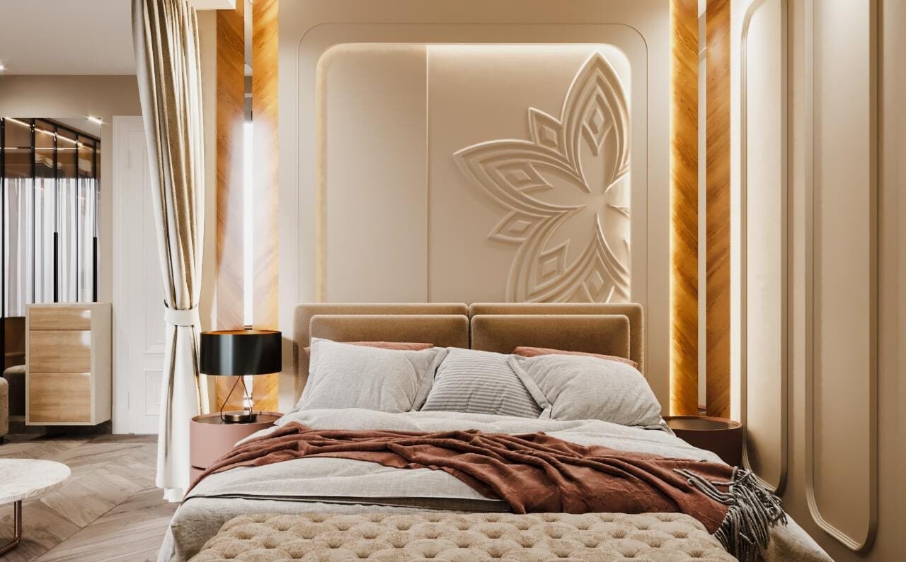 A bedroom worked in relief: a lotus carved into the panel above
                  the bed, warm timber reveals to either side and light washing
                  down the moulding.