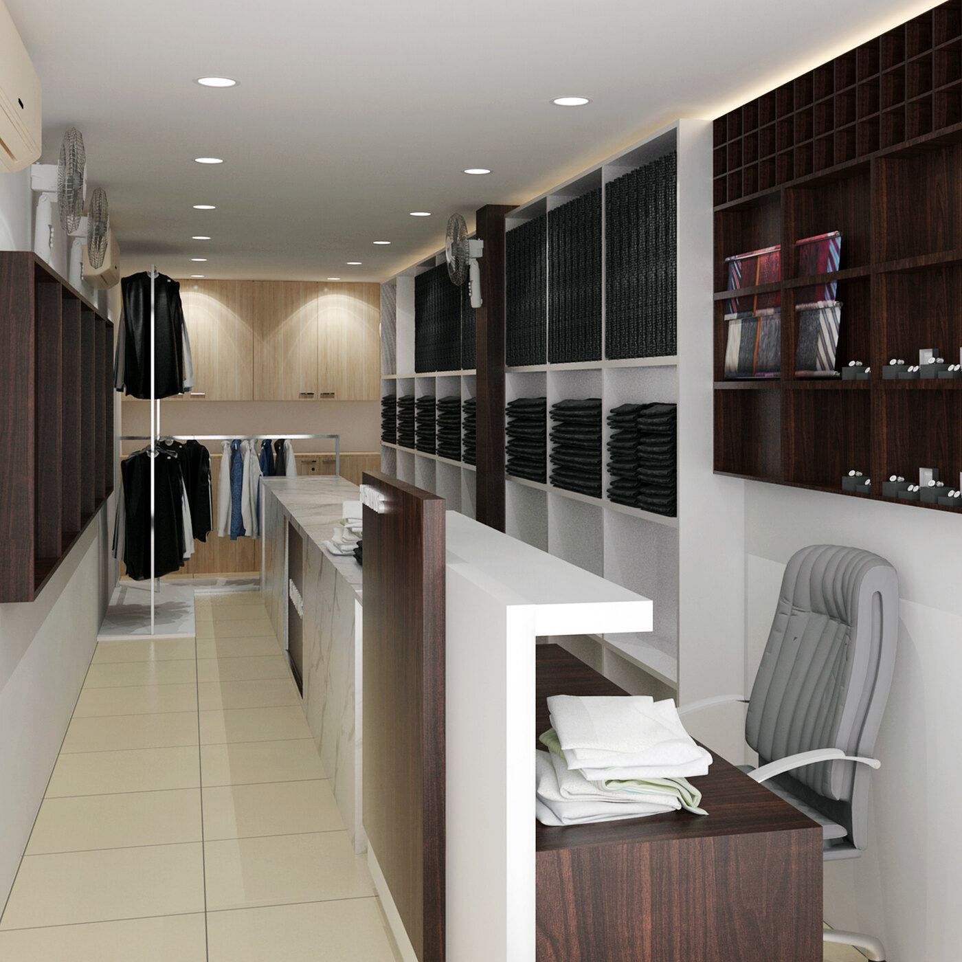 The Highmens showroom: counters and pigeonhole shelving stacked with folded fabric down a narrow room.