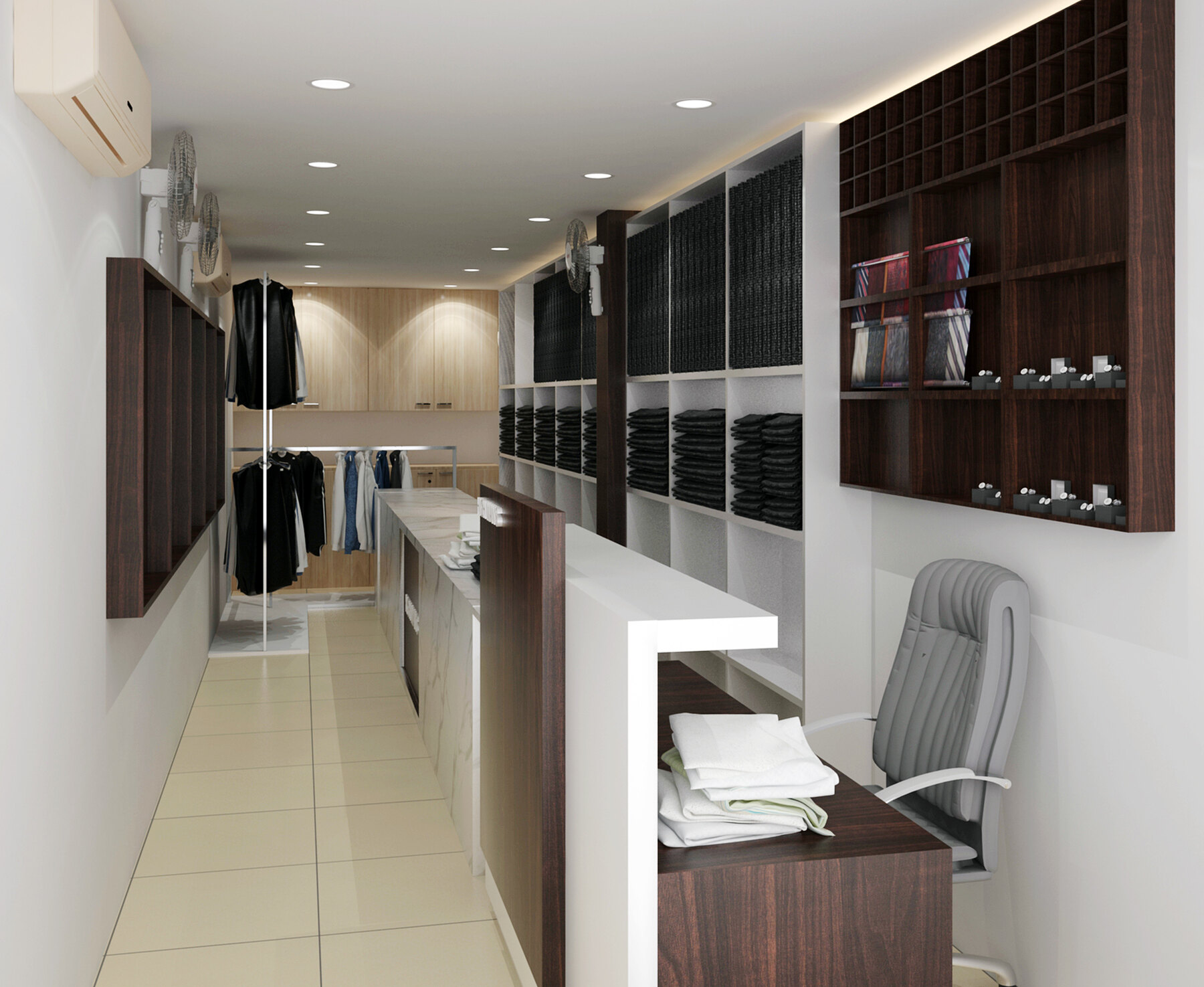 The showroom as designed: a clear tiled floor between a hanging wall on the left and a run of counters, open cubbies and pigeonhole shelving on the right, with a desk at the near end.