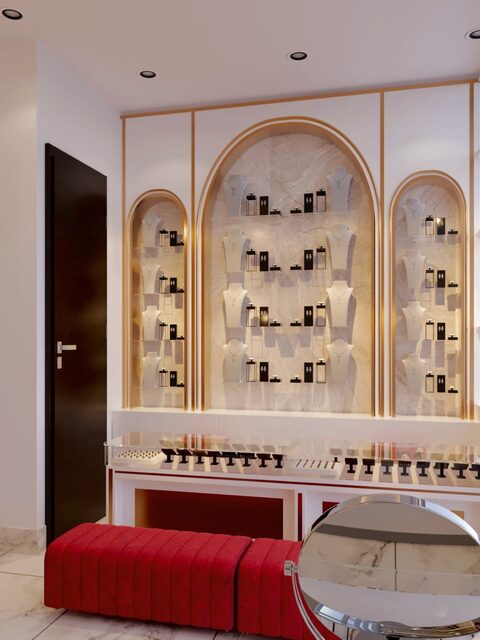 Lit arched shelving carrying product, a red bench and a full-height mirror alongside.