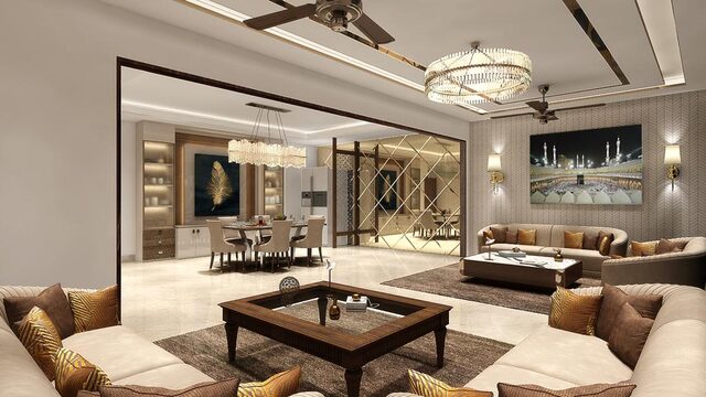 A long living and dining room under exposed timber beams and two chandeliers.