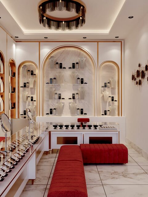 A beauty store in gold-trimmed arches, product shelving and a long red bench.
