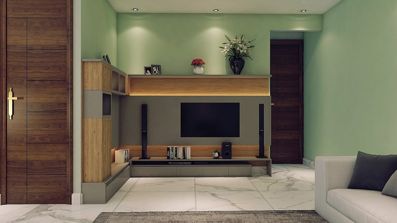 The media wall, with the screen recessed into timber panelling beside a run of open shelving.